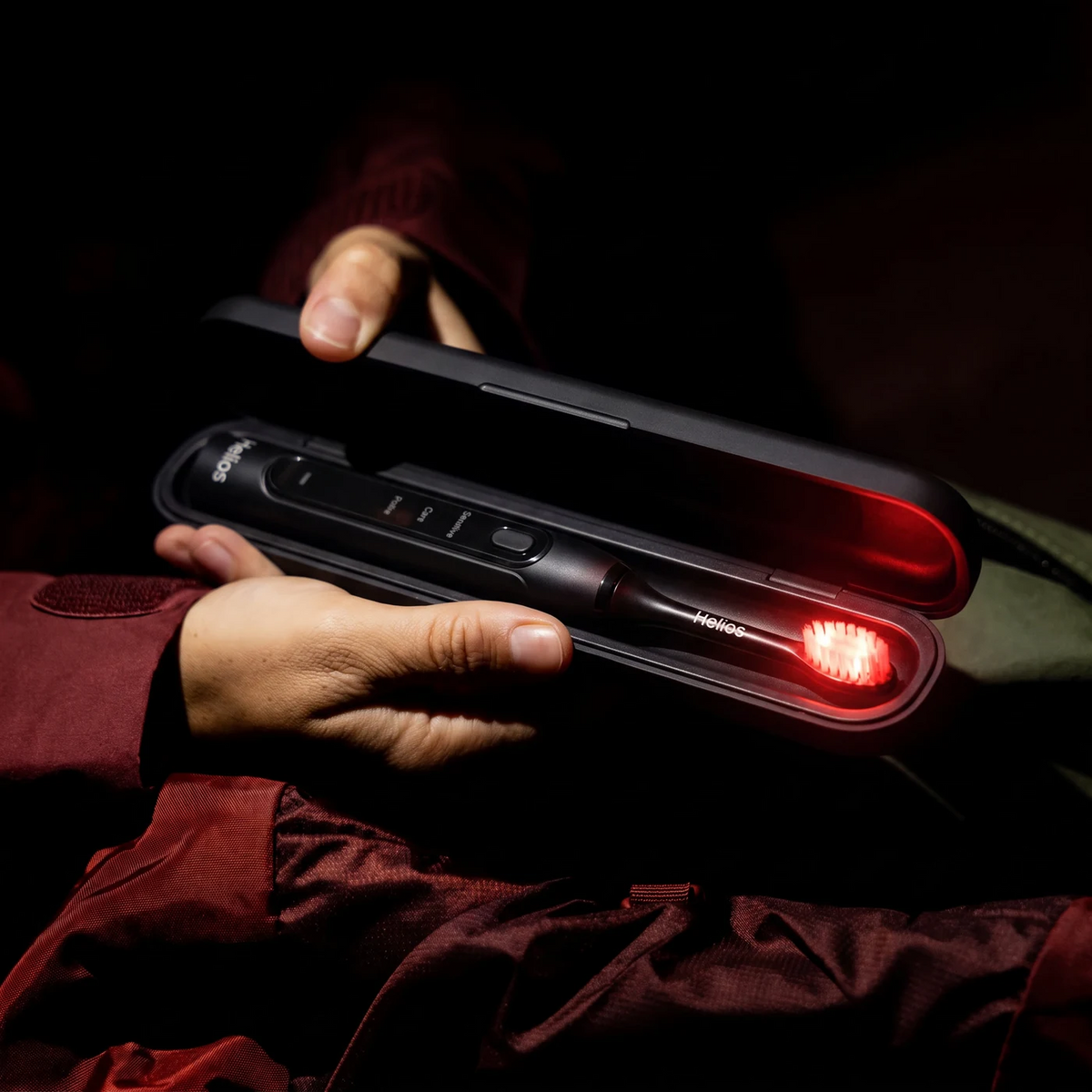 Helios toothbrush inside its protective travel case